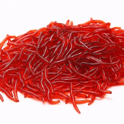 Vibrant red artificial earthworms for fishing, perfect for attracting a variety of fish species