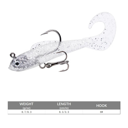 Clear artificial swimbait for bass featuring a shiny finish and double hooks for enhanced fishing success