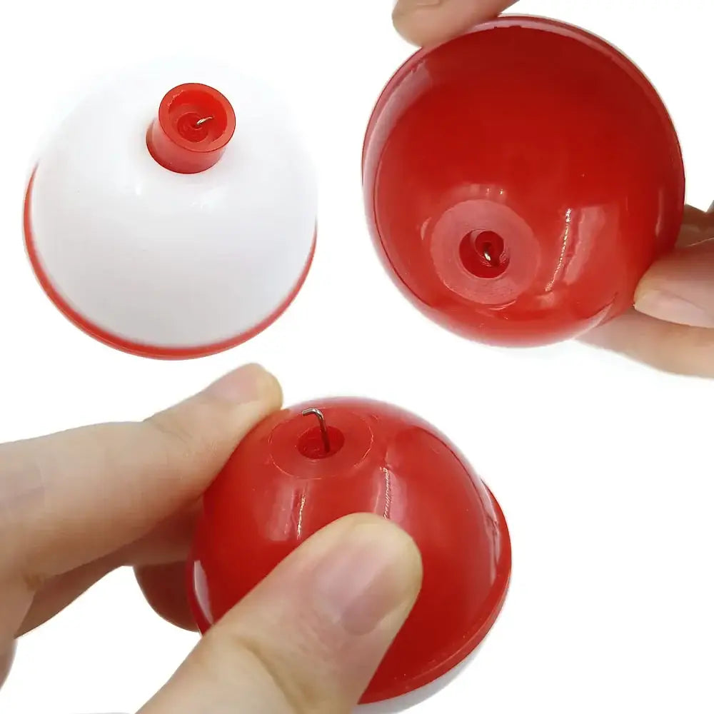 Easy attach fishing bobbers in red and white for effortless fishing setups and enhanced visibility