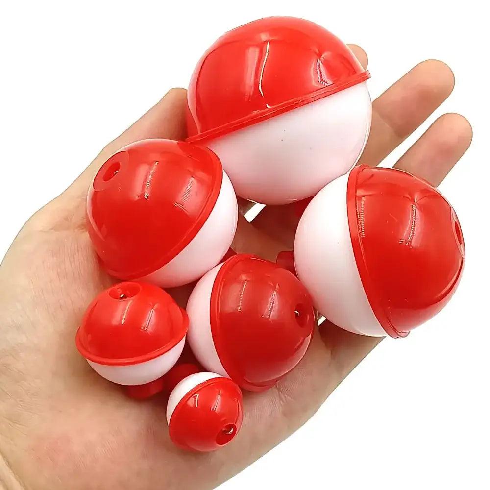 Set of red and white easy attach fishing bobbers in various sizes for effective fishing and floatation