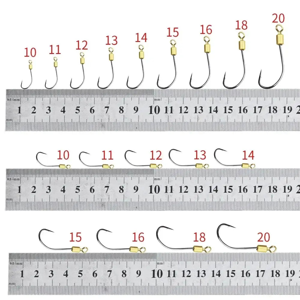Various sizes of double hook rigs for fishing displayed with a ruler for precise measurement