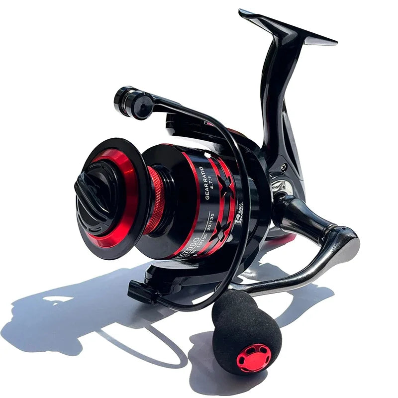 High performance fishing reel with sleek black and red design, suitable for both freshwater and saltwater fishing.