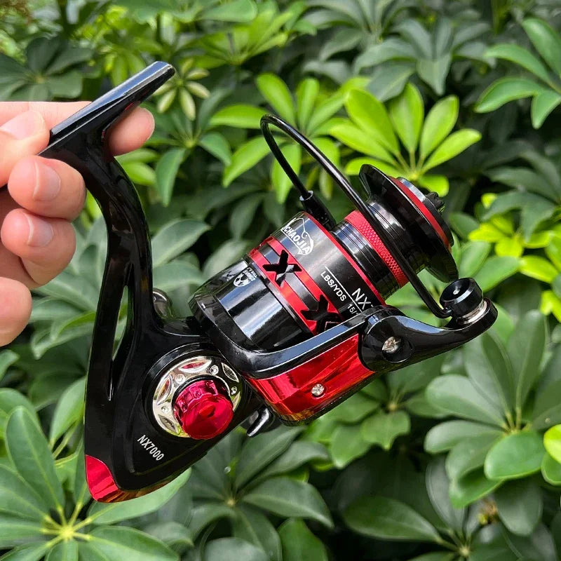 High performance fishing reel in black and red with ergonomic handle for easy use on fishing trips