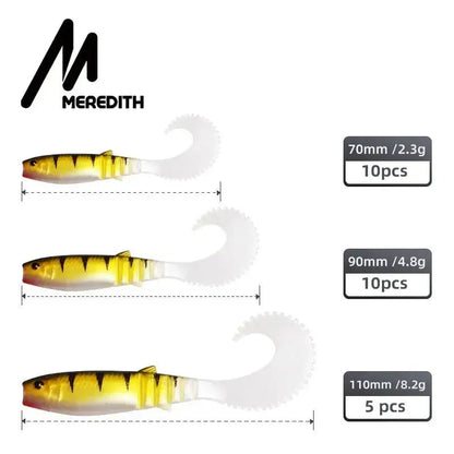 Meredith Cannibal Curved Tail Lure set in three sizes, perfect for attracting various fish species
