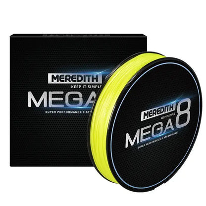 Meredith Mega 8x fishing line on a spool, showcasing its bright yellow color and durable packaging