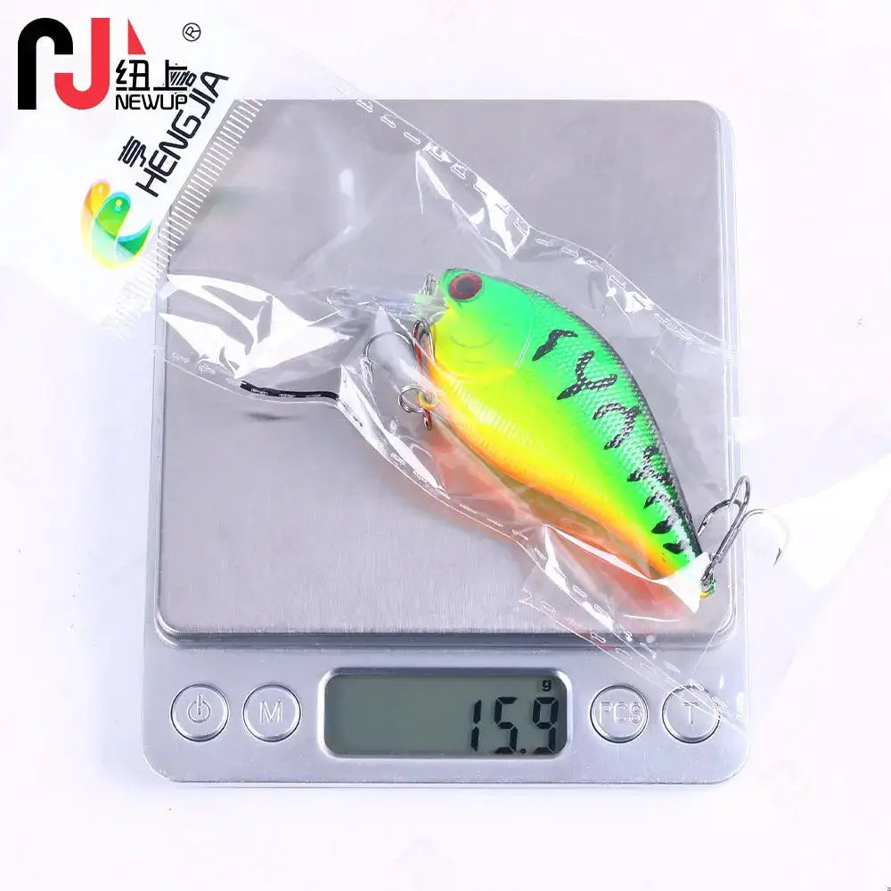 Premium crank bait fishing lures displayed on a digital scale showing 15.9 grams for accurate weight