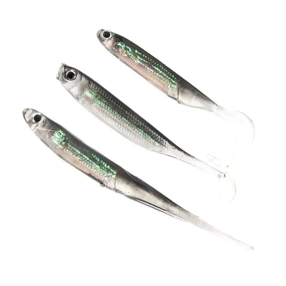 Three silver minnow fishing lures with shiny surfaces for attracting a variety of fish
